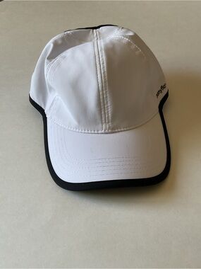PONYFLO WOMENS ADJUSTABLE BASEBALL CAP WHITE WITH BLACK TRIM OS NWT